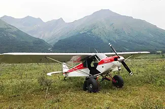 Racing River Air Ltd wheel-plane charter services in Toad River, British Columbia